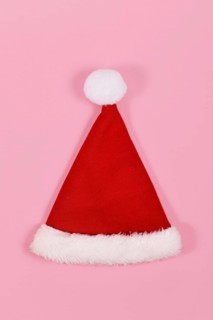 Single red Santa hat on pink background