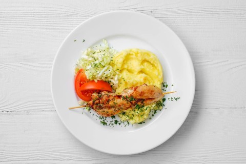 Top view of plate with chicken shashlik