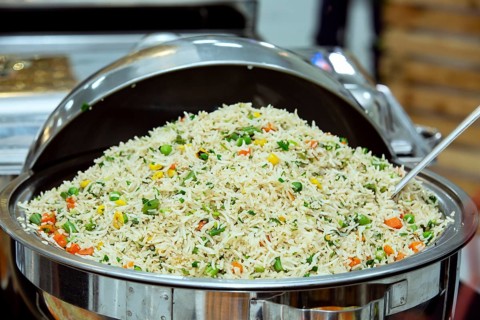 Cantonese style fried rice in a large bowl at a wedding reception