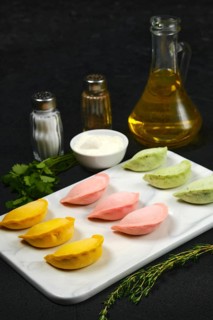 Frozen colorful dumplings with chicken and turkey ground meat