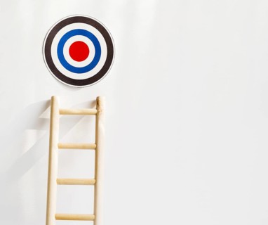 Front view target with wooden ladder copy space