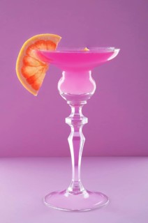 Viola cocktail on purple background