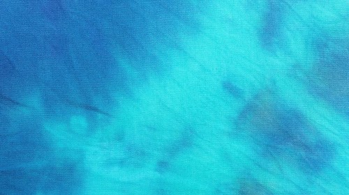 Gradient tie dye textile surface