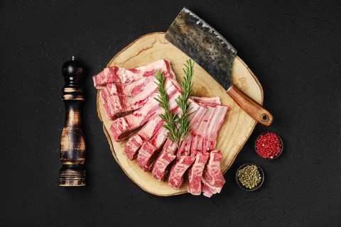 Top view of raw fresh lamb rib roast