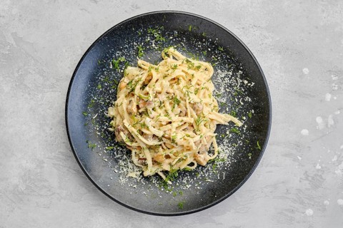 Top view of pasta with honey agarics