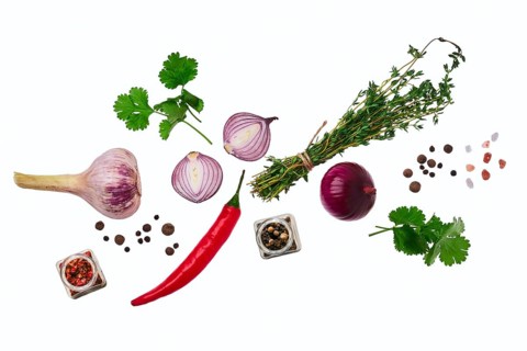 Top view of variety of spice isolated on white background. Garlic