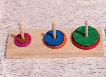 Colorful wooden puzzle element the view