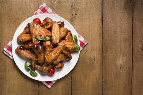 Top view chicken wings plate with sesame seeds copy space. Resolution and high quality beautiful photo