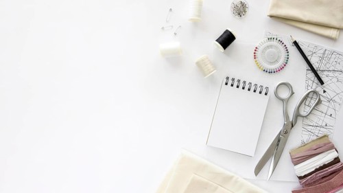 Top view sewing essentials with textiles copy space. Resolution and high quality beautiful photo