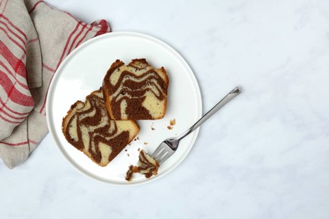 Two pieces of marble cake on plate