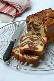 Marble cake and knife on cake rack