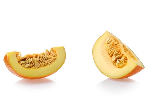 Two pieces of pumpkin isolated on white background