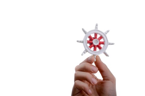 Isolated Ship steering wheel onhand