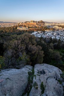 View from Philopappos Hill over the city at sunset