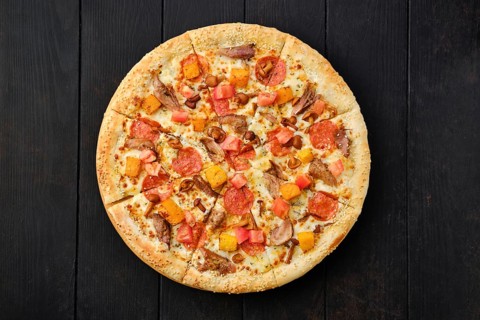 Top view of pizza with pumpkin