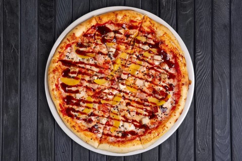 Top view of pizza with chicken