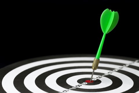 High angle dart stuck target bullseye