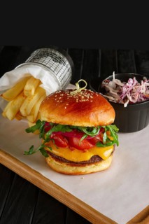Juicy beef burger with lingonberry sauce