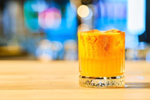 Cold cocktail with tequila and sea buckthorn