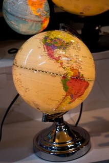 Little colorful model globe with maps on it