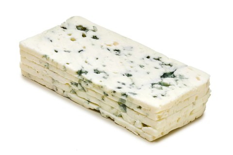 Slices of dorblu cheese isolated on white background