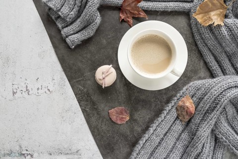 Coffee with milk warm sweater shabby surface