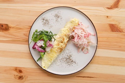 Omelette with crab meat and salad