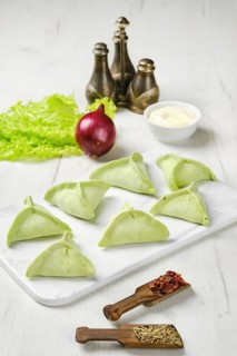 Frozen dumplings with spinach
