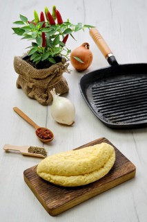 Homemade cheese for frying on cast iron grill pan