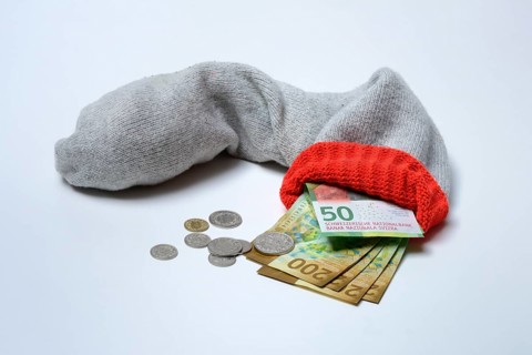 Banknotes in woollen sock