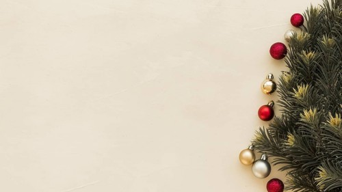 Green fir tree branches with baubles