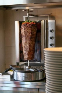 Turkish dish Doener Kebab as a turning roast