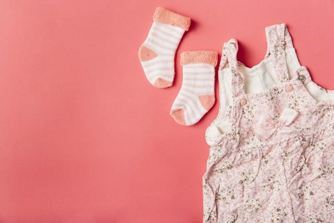 Pair sock baby dress bright colored background
