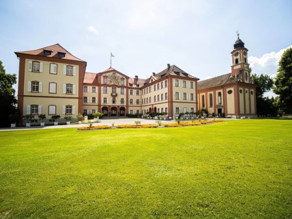 Palace facade with St. Mary's Church