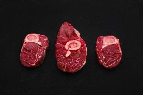 Overhead view of tree raw beef shank cross cut