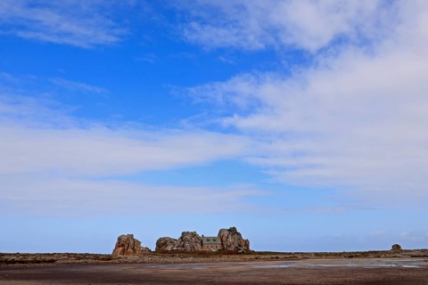 Country house between rocks near Le Gouffre