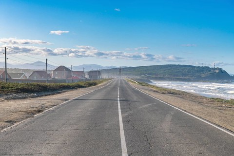 Straight road at Beach at Okhotskoye