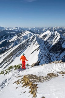 Ski tourers at the summit of Sonntagshorn