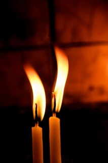 Burning candle making light in view