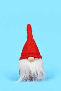 Cute Christmas gnome ornament with white beard and red hat on blue background
