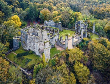 Autumn over Berry Pomeroy Castle from a drone