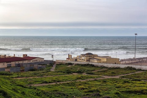 Restaurant and Muslim cemetery by the sea