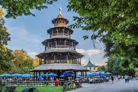 Beer garden at the Chinese Tower in the English Garden in the evening sun