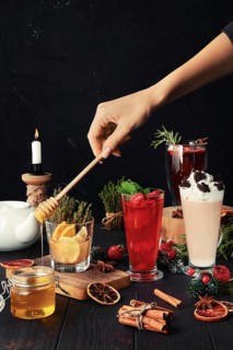 Composition with herbal and fruit tea with ingredients on the table