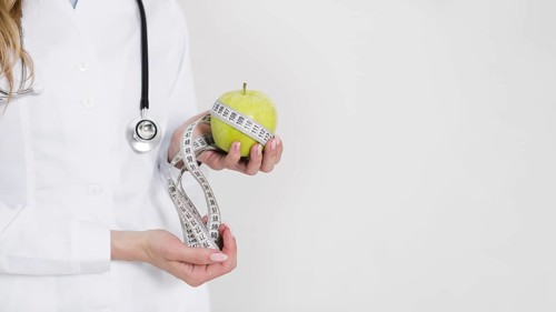 Diet concept with female scientist healthy food