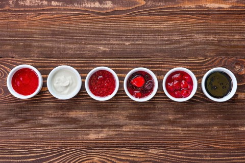 Overhead view of assortment of fruit puree. Jam