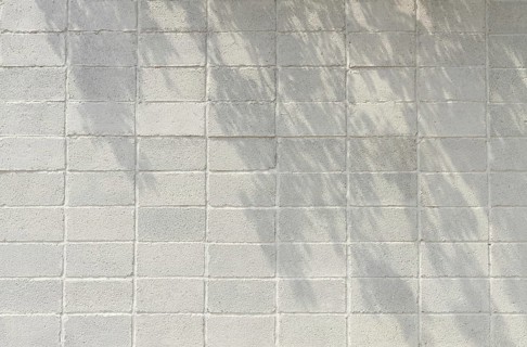 Copy space front view white brick wall