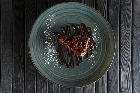 Piece of puffy chocolate cake and souffle. Top view