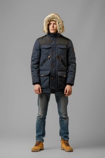 Full length portrait of handsome man in warm coat with hood posing in studio