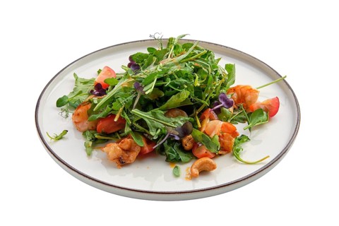 Salad with shrimps and fresh vegetables isolated on white background
